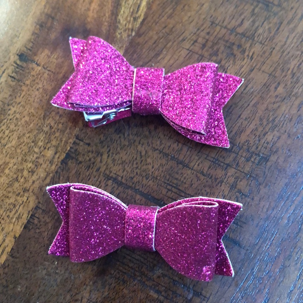 Pink glitter bow clips